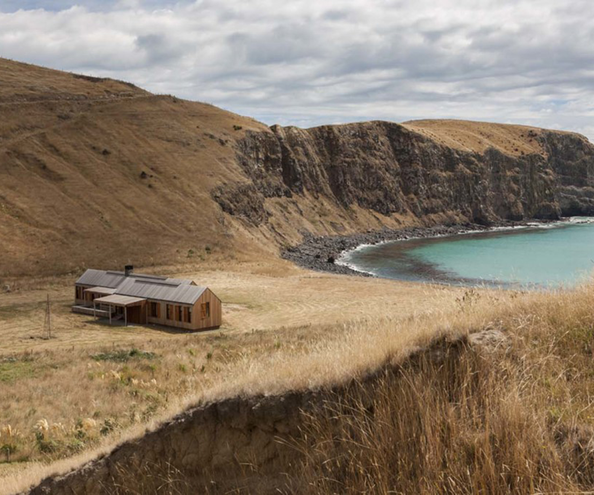 Rocky headlands frame the isolated bay.