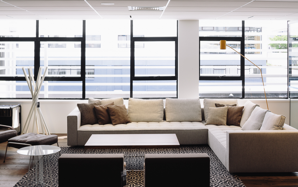 Upstairs, the showroom features furniture from Zanotta, including this 'Kilt' sofa by Emaf Progetti. Photograph by Simon Wilson.