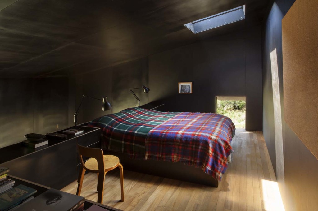 The sleeping area upstairs features a window in the ceiling that allows a view of the stars. Photograph by Darryl Ward. 