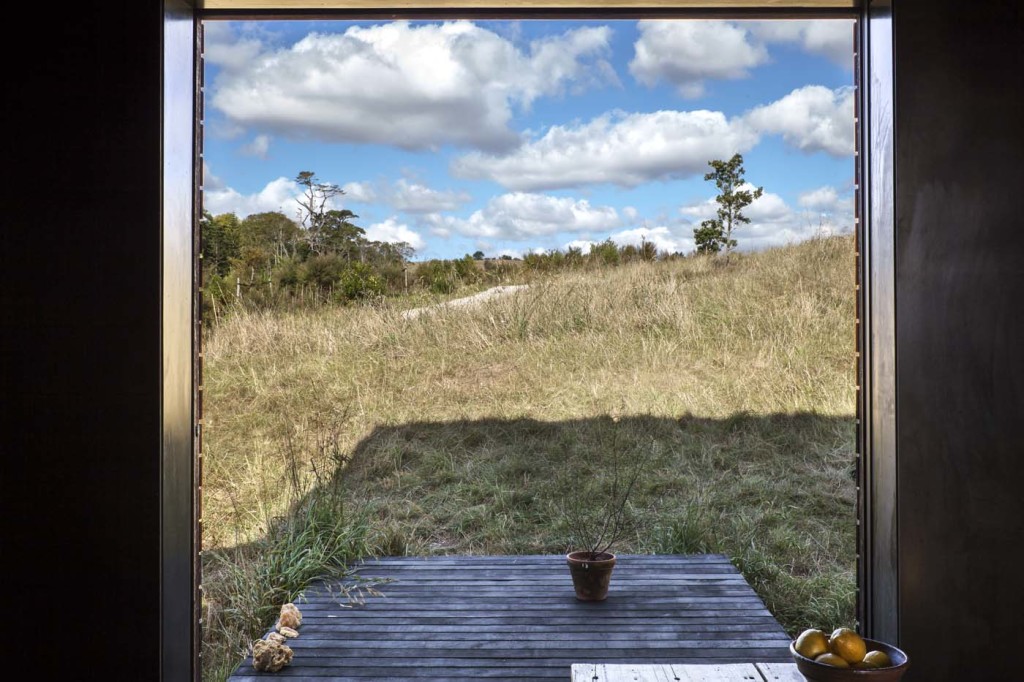 The view from the interior of one of the cabins onto its small deck. Photograph by Darryl Ward. 