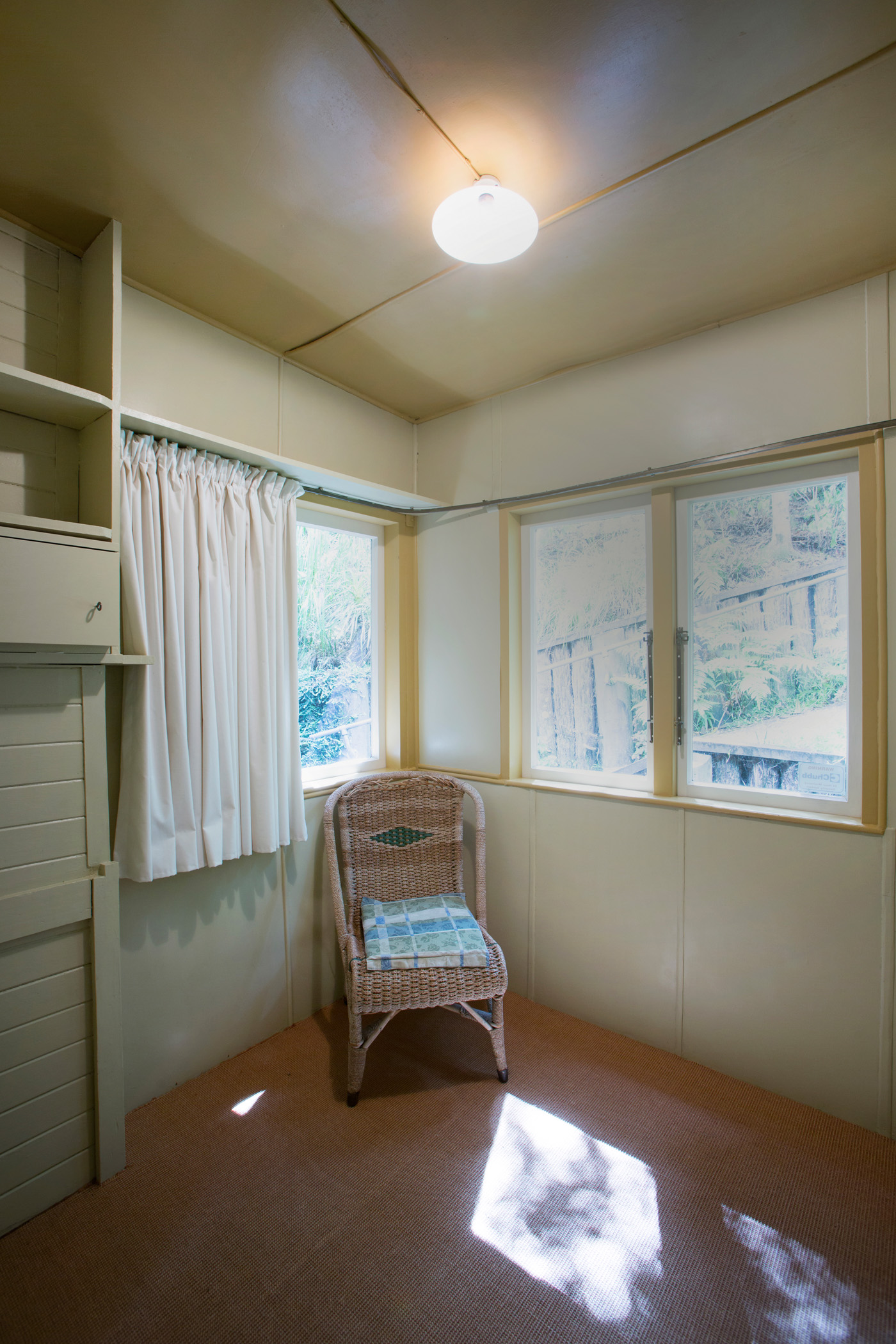 A chair in the bedroom that McCahon shared with his wife Anne. Photograph by Jeremy Toth.