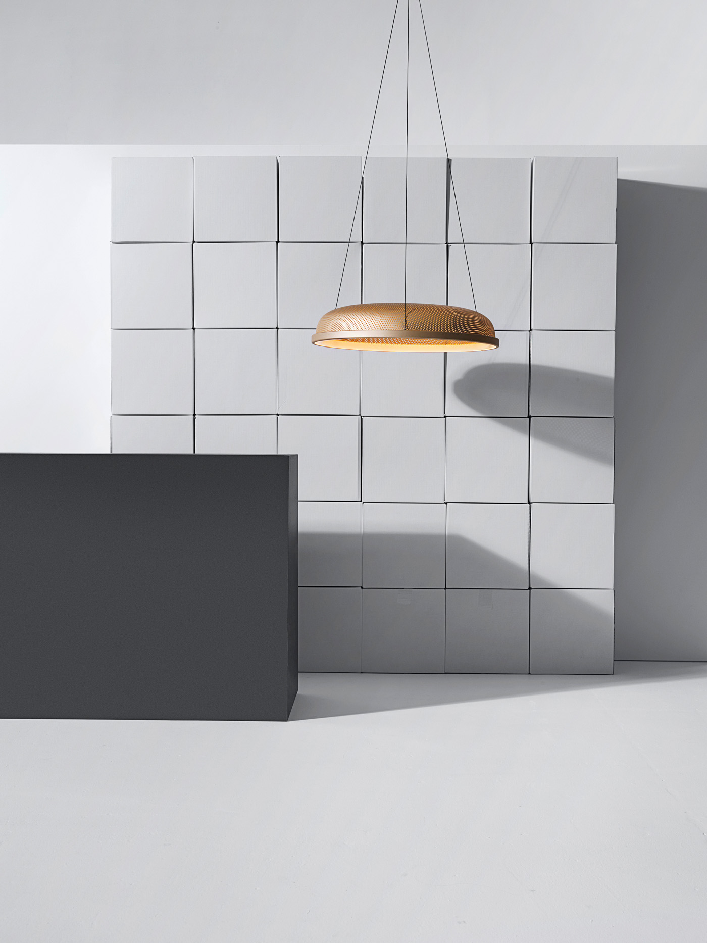 The 'Mesh Space Pendant' by Flynn Talbot for Resident. Photograph by Toaki Okano. Styling by Sam Smith and Catherine Wilkinson.