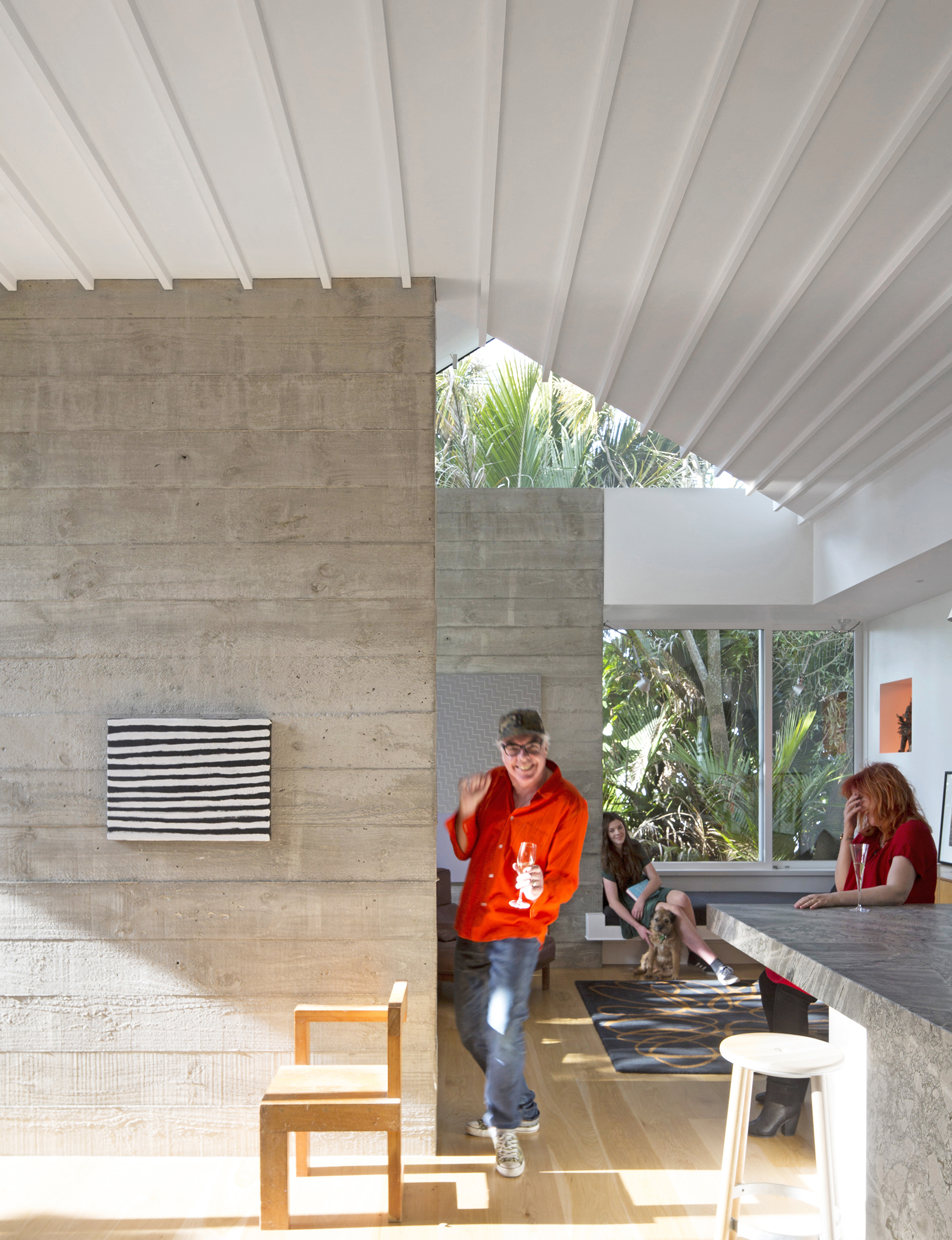 Artist John Reynolds, his wife Claire McLintock, their daughter Vita and Jock, the family dog, moved out for 14 months while their home was being transformed. The painting is by Phyllis Thomas from the ‘Gemerre’ series (2013). 