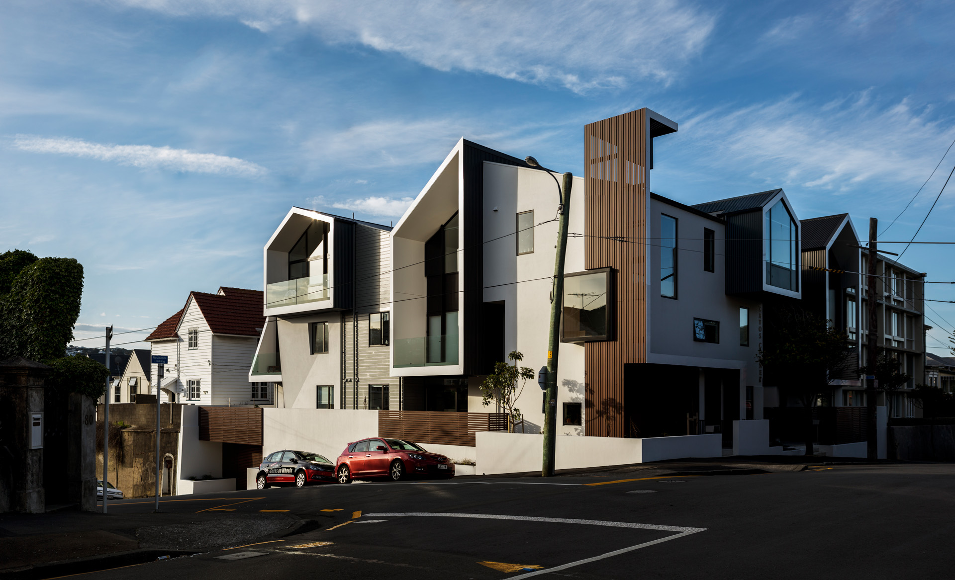 The apartments occupy a prominent corner site. Photo by Jeff Brass. 