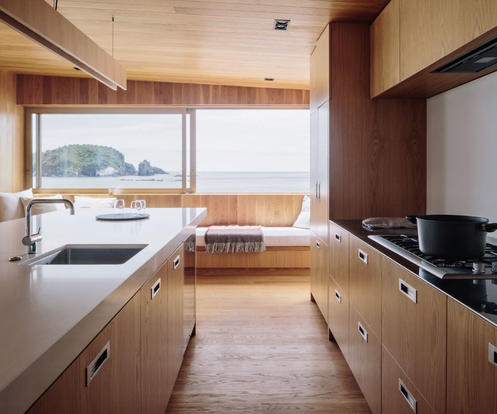 The kitchen of this Hahei holiday home was built for socialising